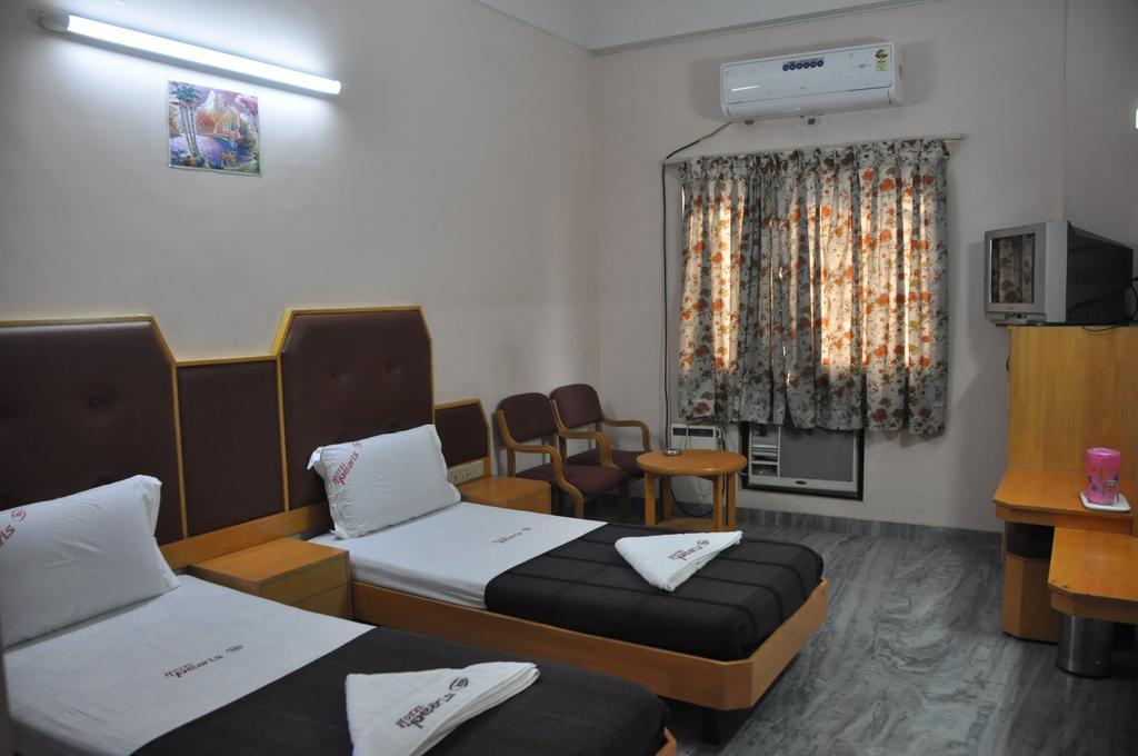 Hotel Pearls Madurai Quarto foto